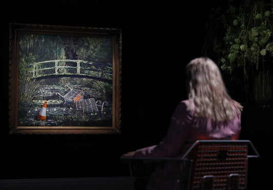 Banksy artwork sells for almost $10 million at auction
